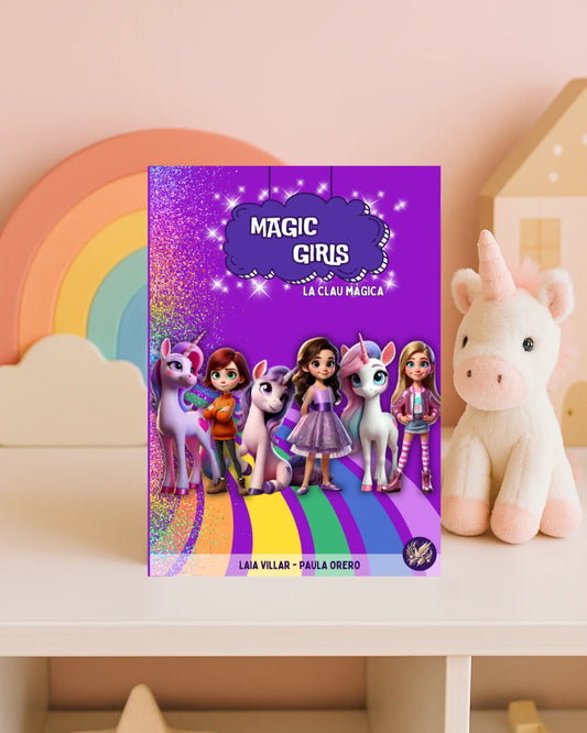 Libro infantil Magic Girls La Clau Màgica de Laia Villar y Paula Orero, con unicornios y niñas mágicas en portada morada con arcoíris