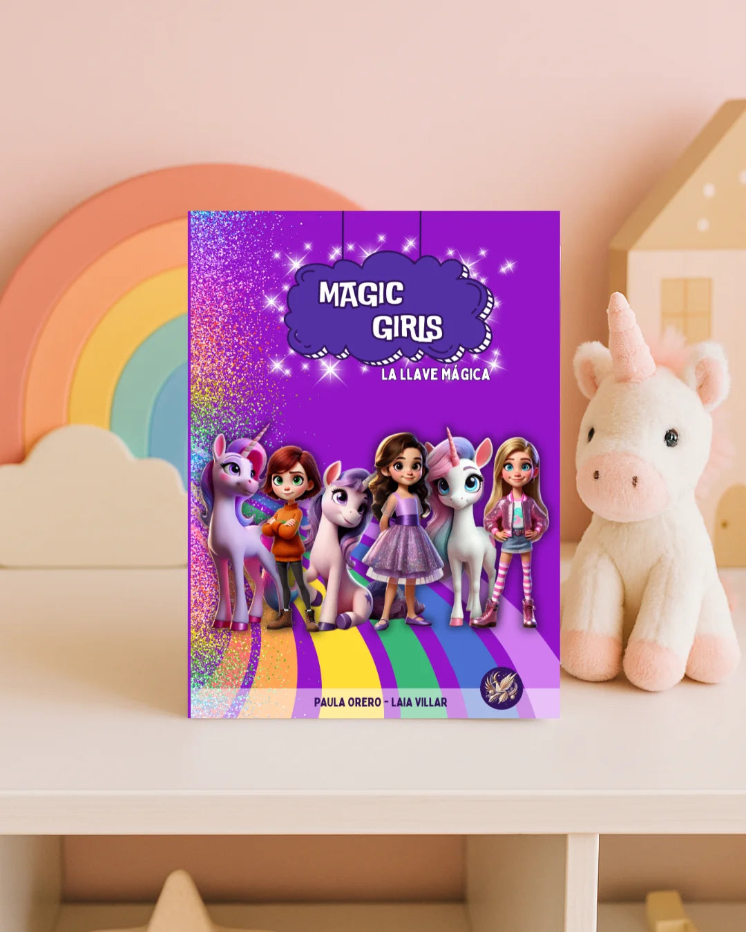 Libro infantil Magic Girls La Llave Mágica de Paula Orero y Laia Villar, con unicornios y niñas mágicas en portada morada con arcoíris